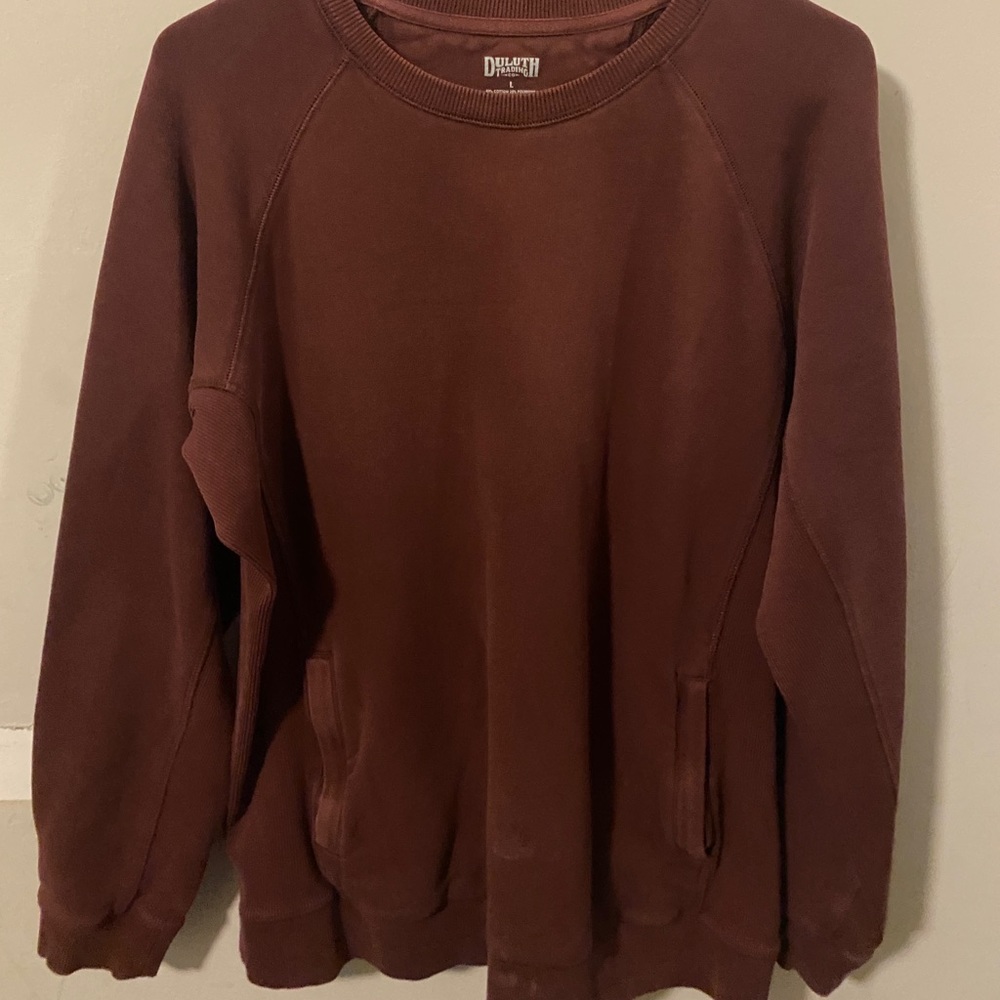 Red sweater with zipper bags